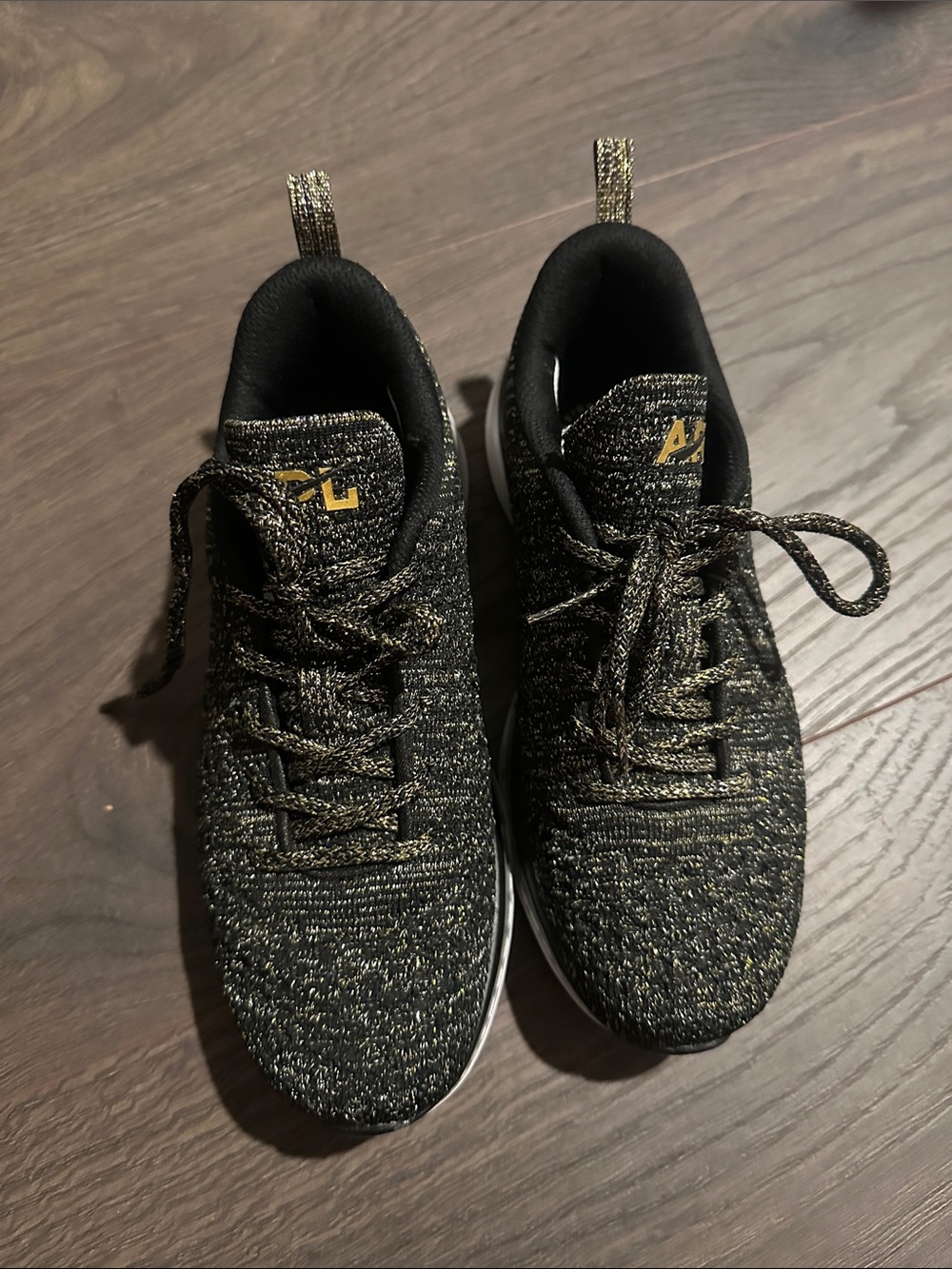 APL Black & Gold Knit Sneakers with Metallic Accents